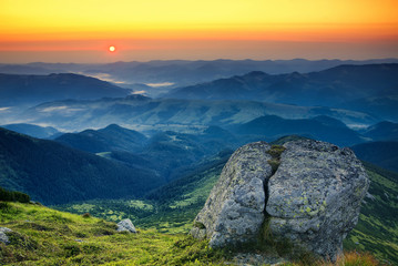 Obraz premium Mountain valley during sundown. Beautiful summer landscape