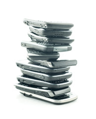 big stack of broken mobile phones - obrazy, fototapety, plakaty