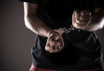 Man handcuffed hands