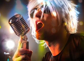 Rock singer with retro microphone