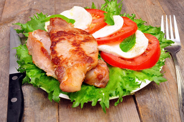 meat chops with caprese salad