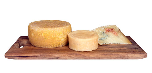 Cheeseboard with artisan, rustic cheeses. Isolated.