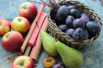 Seasonal autumn friuts like apple, plums and pears