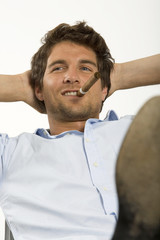 Junger Mann mit Zigarre,Portrait