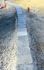 alignement de pavés en granit,,construction de bordures