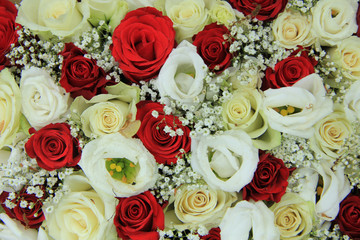 Red and white roses in a bridal bouquet