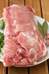 raw pork on white dish