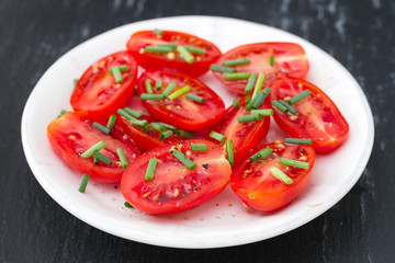 tomato salad with onion in plate