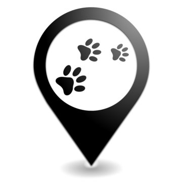 pattes et empreintes de chien sur symbole localisation noir
