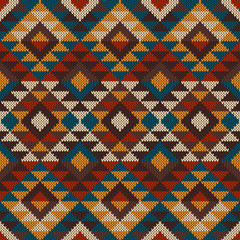 Traditional Tribal Aztec seamless pattern on the wool knitted te