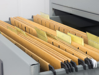 Abstract background image of colorful hanging file folders in dr