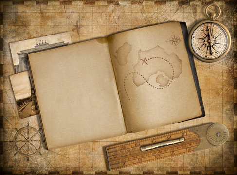 Adventure and travel concept. Vintage map, copybook and compass
