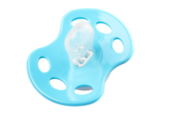 Blue pacifier over white background 