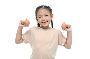 Asian girl smiiing and holding egg