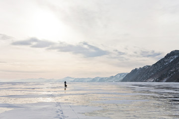 Lonely traveler on Baikal surface