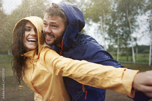 Romantic love in the pouring rain