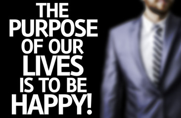The Purpose of Our Lives is To Be Happy written on a board