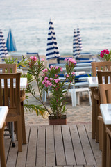 Sun loungers on beach  before the sunset