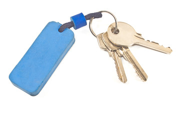 Keys with blue tag isolated on white