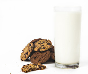 Milk glass  and cookies on white background