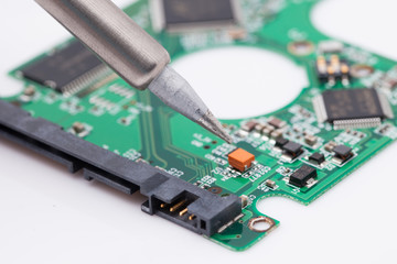 worker repair green harddisk pcb