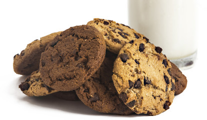 Milk glass  and cookies on white background