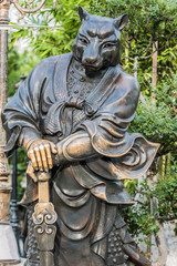 Naklejka premium Chinese Zodiac Dog statue Sik Sik Yuen Wong Tai Sin Temple Kowlo