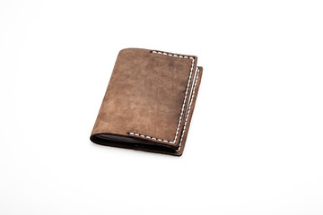 brown leather wallet on white, close up