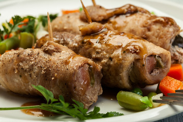 Pork rolls and vegetables