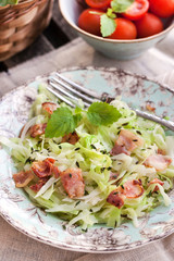 Braised cabbage with bacon and thyme