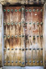 Hand crafted wooden door in Stonetown at Zanzibar