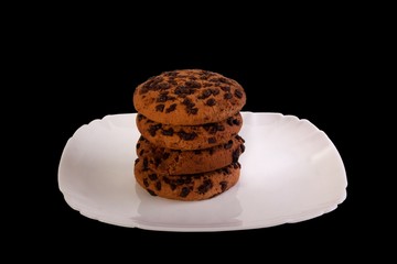 Cookies in a stack isolated on black