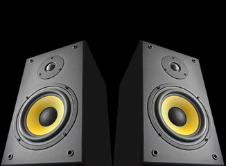 Loudspeakers on black background