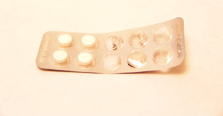 Packs of pills isolated on white background