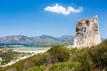 Fototapeta premium Old Tower of Porto Giunco bay. Sardinia island. Italy.
