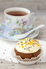 Sweet pumpkin cupcake with cream cheese icing