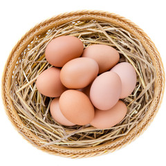 brown chicken eggs in basket
