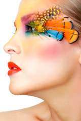 Woman with false feather eyelashes makeup