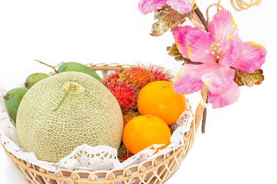 fruit in basket on white background