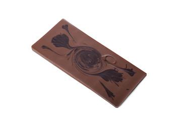 Studio shot of milk chocolate bar with pattern
