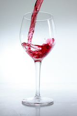 Red wine poured in a glass