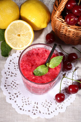 Fresh cold cherry cocktail with mint and lemon