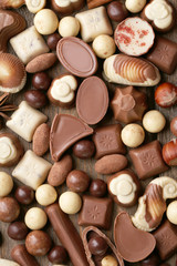 Different kinds of chocolates close-up background
