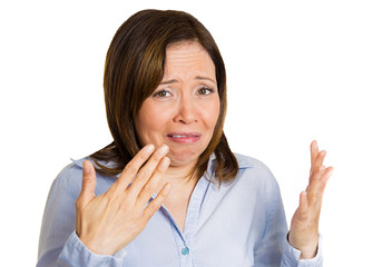 woman pinches her nose looks with disgust, something stinks