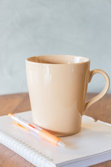 Cup of coffee on simply work table