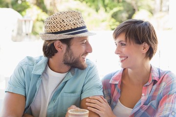 Happy couple enjoying coffee together