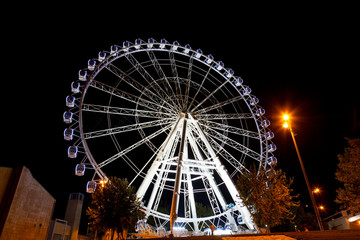 Working big wheel at night in Zaragoza, Spain