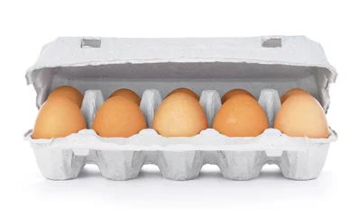 Abwaschbare Fototapete Ten brown eggs in a carton package © Zakharov Evgeniy