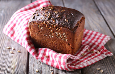 Fresh bread on wooden table, close up