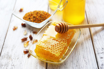 Fresh honey on wooden table